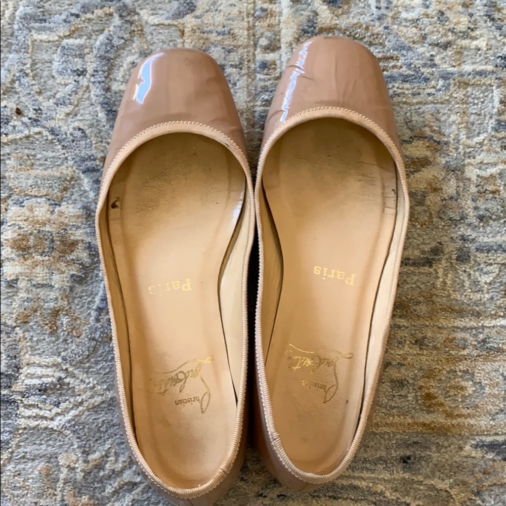 Christian Louboutin beige patent leather flats